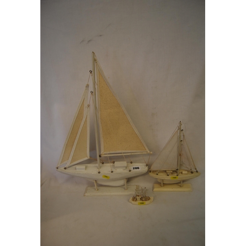 286 - 2 GRADUATED MODEL YACHTS & MINIATURE FISHING BOAT