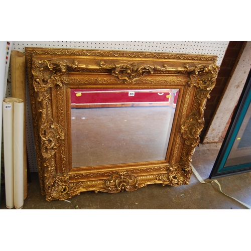 475 - MODERN RECTANGULAR BEVELLED WALL MIRROR IN DEEP GILT FRAME