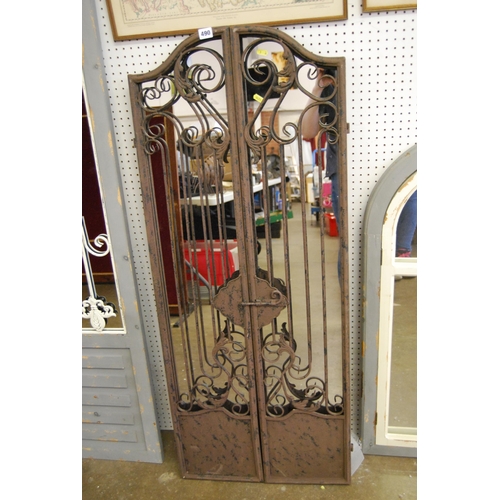 490 - WROUGHT IRON GARDEN FEATURE MIRROR ENCLOSED BY PAIR OF RAIL DOORS 52CM WIDTH X 129CM HIGH