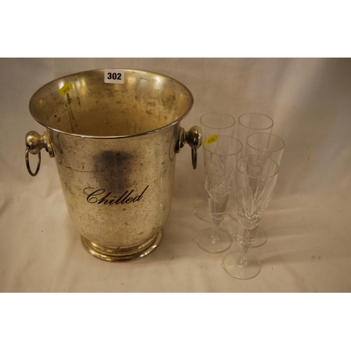 302 - STAINLESS STEEL ICE BUCKET & 4 CHAMPAGNE FLUTES