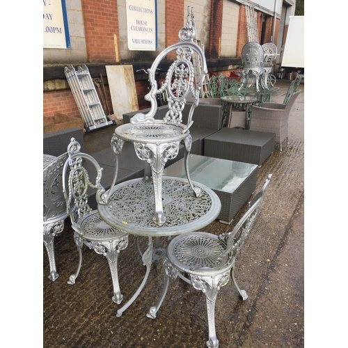 671 - CIRCULAR METAL GARDEN TABLE AND 3 CHAIRS