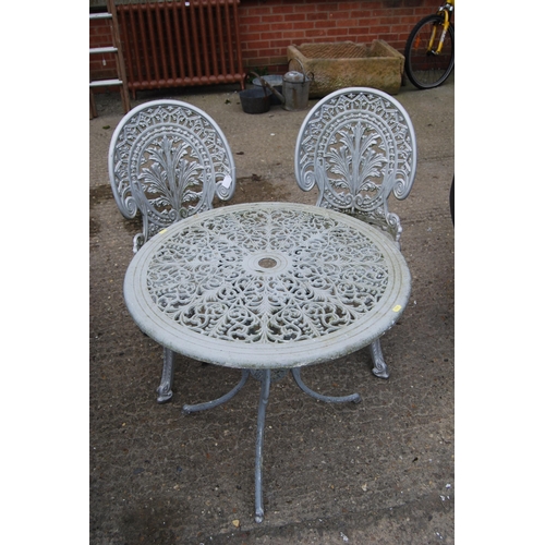 710 - GARDEN TABLE AND 2 CHAIRS