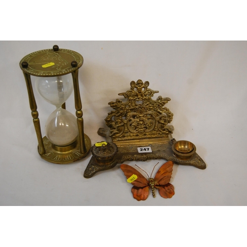 247 - EMBOSSED BRASS DESK STAND, COPPER & BRASS BUTTERFLY AND LARGE BRASS EGG TIMER