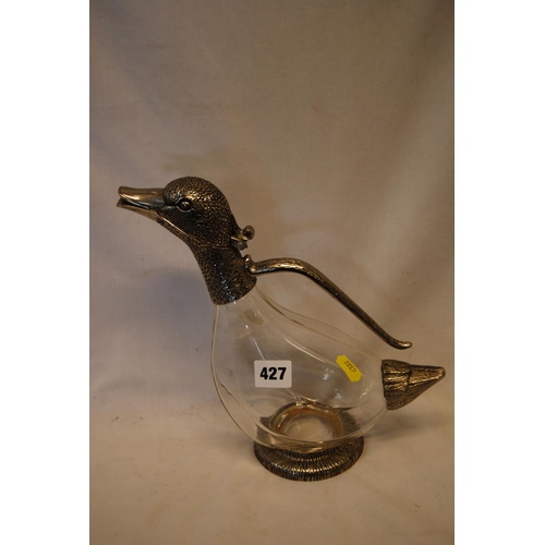 427 - CLARET DECANTER IN THE SHAPE OF A DUCK WITH METAL MOUNTS