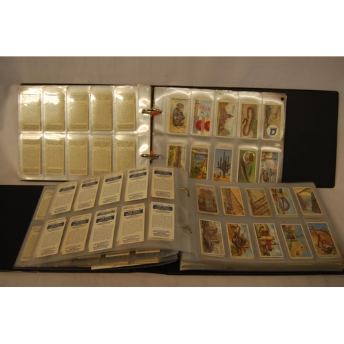 493 - 2 ALBUMS OF CIGARETTE CARDS