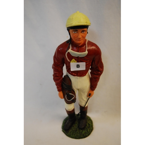 8 - MODERN COMPOSITE FIGURE OF JOCKEY CARRYING SADDLE & WHIP