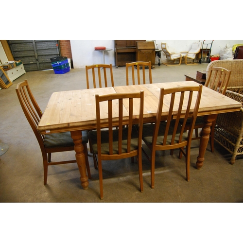 533 - PINE EXTENDING DINING TABLE AND SET OF 6 RETRO TEAK DINING CHAIRS