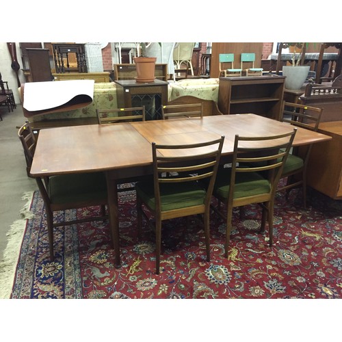 553 - MEREDEW RETRO TEAK DINING SUITE COMPRISING EXTENDING DINING TABLE, 6 CHAIRS AND SIDEBOARD