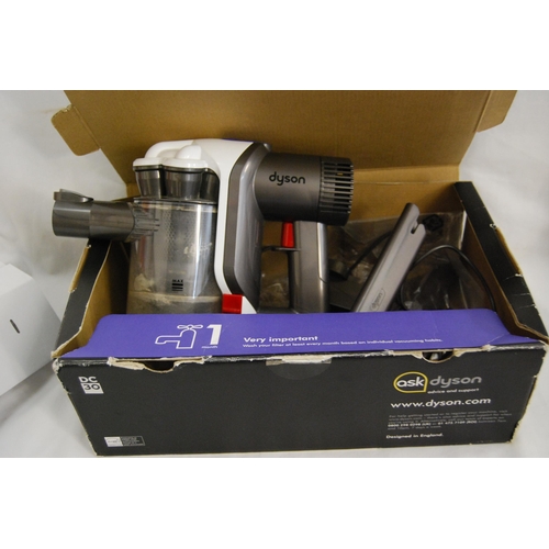 56 - DYSON HANDHELD VACUUM WITH CHARGER