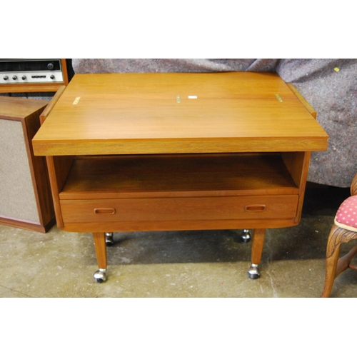 420 - RETRO TEAK TEA TROLLEY WITH FOLD TOP, SHELF UNDER, FITTED CUTLERY DRAWER ON CASTORS