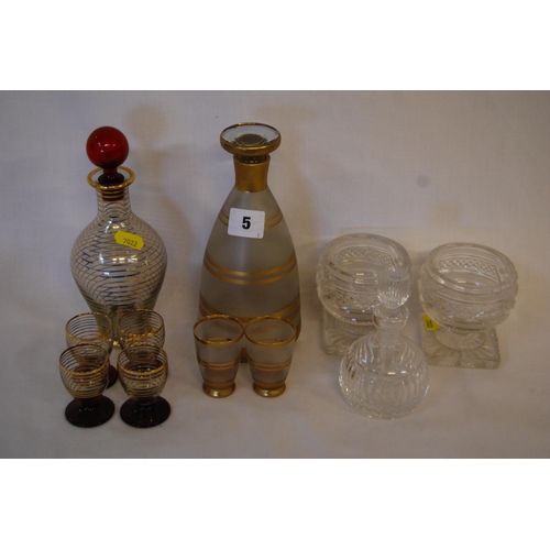 5 - PAIR OF 19TH CENTURY CUT GLASS TABLE URNS, CUT GLASS BOTTLE AND 2 PART LIQUER SET