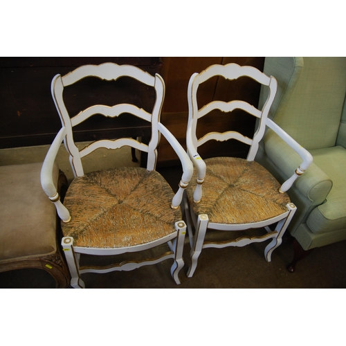 561 - PAIR OF FRENCH PAINTED AND GILDED RUSH SEATED CARVER CHAIRS