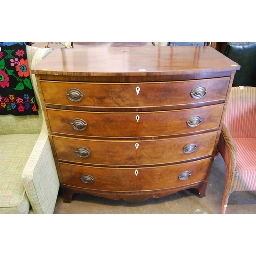 574 - REGENCY MAHOGANY BOW FRONTED CHEST 4 DRAWERS, DROP BRASS HANDLES AND OVAL ESCUTCHEONS ON BRACKET FEE... 