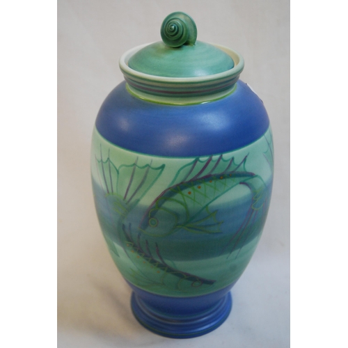 77 - POOLE STUDIO BALUSTER VASE DECORATED SWIMMING FISH WITH SHELL LID; 26CM
