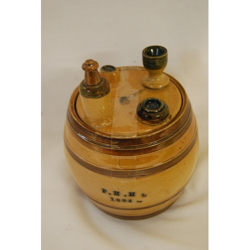 42 - VICTORIAN SILICON CHINA TOBACCO JAR WITH LID SURMOUNTED PIPE, BOTTLE. GOBLET & DISHES INITIALED PHH ... 