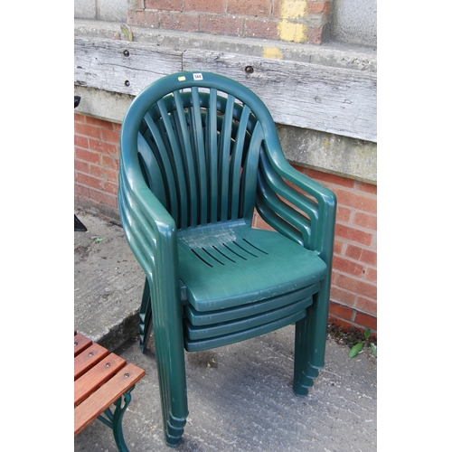 568 - 4 GREEN PLASTIC GARDEN CHAIRS