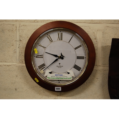 191 - SMALL WORLD RHYTHM MAGIC MOTION CLOCK