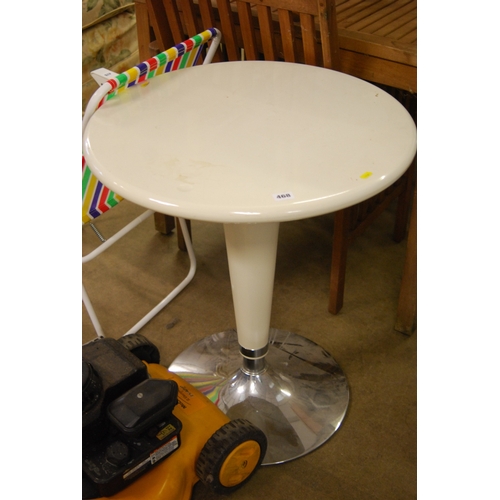 CIRCULAR WHITE BISTRO TABLE ON CHROME BASED