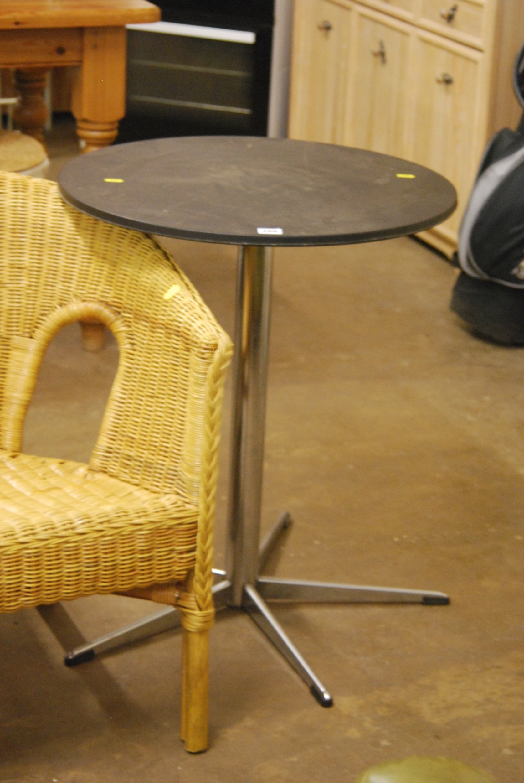 CIRCULAR BLACK TOP BISTRO TABLE ON CHROME BASE