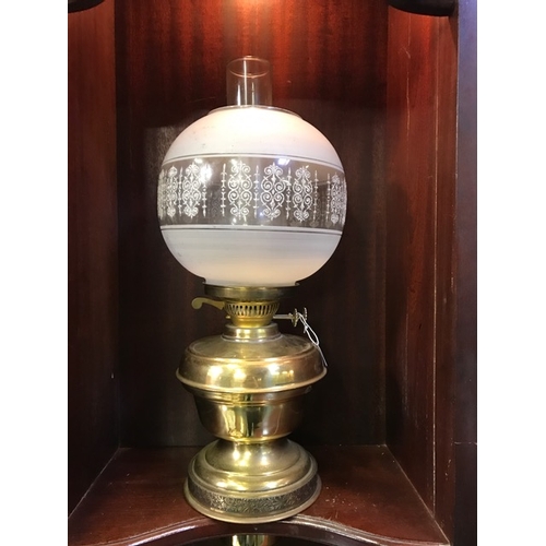 31 - Brass double burner oil lamp, chimney and globe