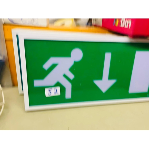 52 - 2 electrical exit signs