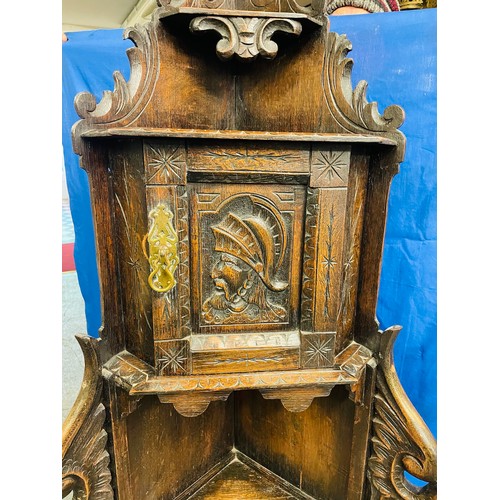 157 - Georgian, heavily carved corner cabinet, 28'' x 68''