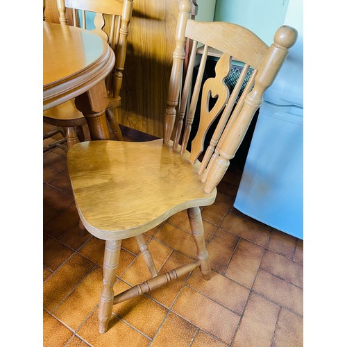 407 - Top quality pine table and 6 chairs in perfect condition, table is 5'3'' x 3' 6'', centre leaf can b... 