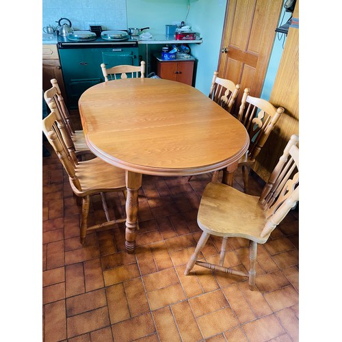 407 - Top quality pine table and 6 chairs in perfect condition, table is 5'3'' x 3' 6'', centre leaf can b... 