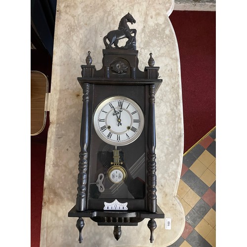 411 - Superb Victorian eight day wall clock with a carved horse motif, complete with key and in perfect wo... 