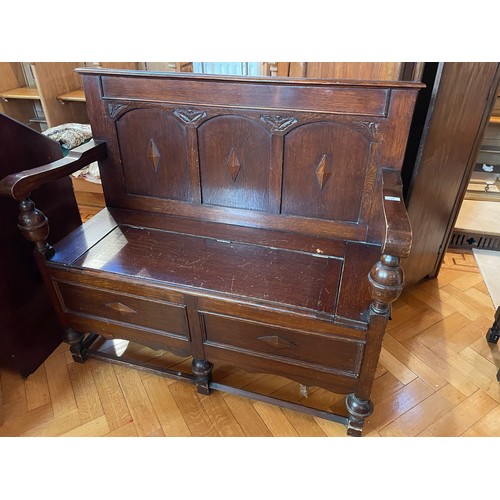 50 - Carved Oak settle with storage