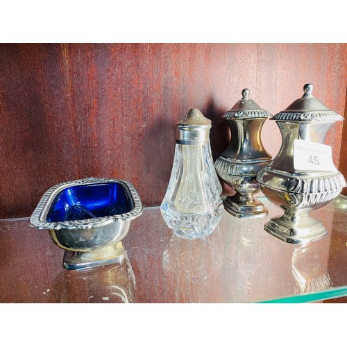 45 - 2 pairs of  salt and pepper shakers and a silver plated bowl with glass liner