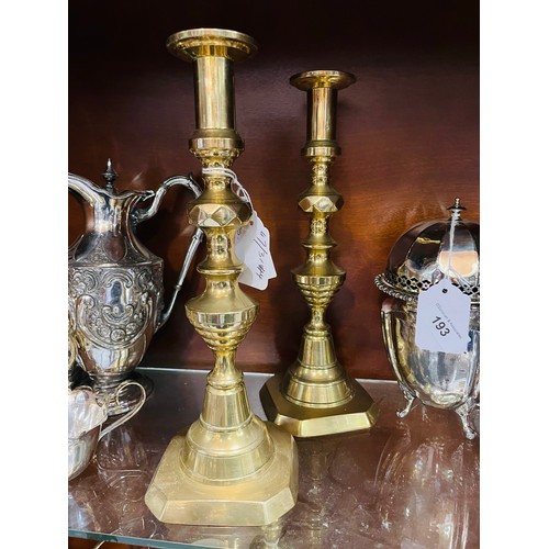 192 - A pair of brass candlesticks 12''h