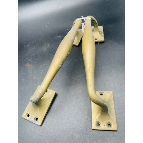 435 - A pair of large brass door handles, 11'5'' l