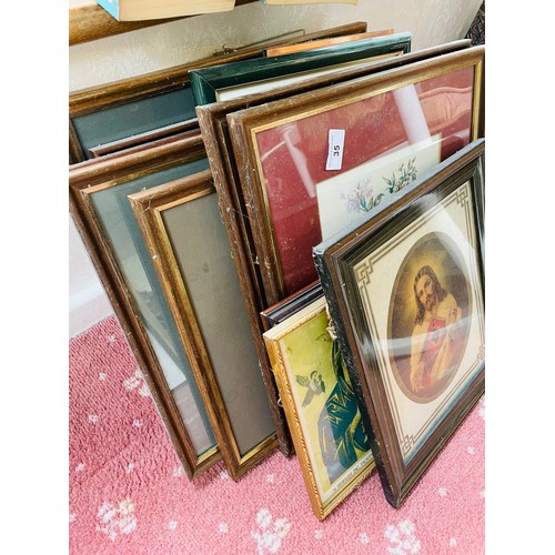 35 - A large collection of framed pictures