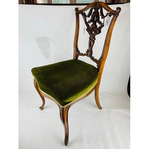 154 - Heavily carved ornate walnut Victorian hall chair, 18''h