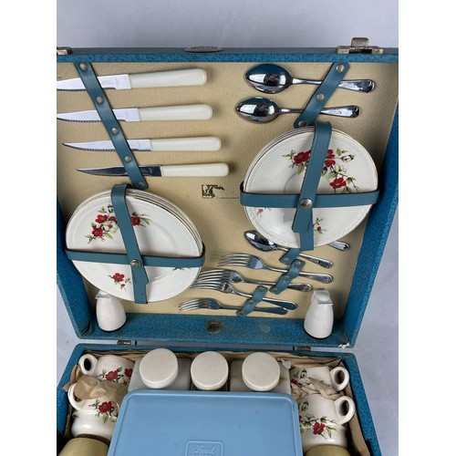 260 - Early Edwardian complete picnic basket with china ware, 2 thermos flasks etc