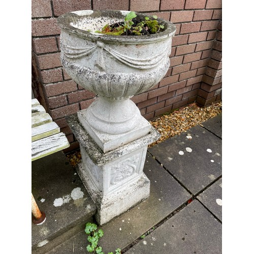 106 - Pair of flower pots on pedestals