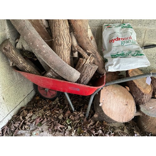 357 - Wheel barrow and quantity of dried timber