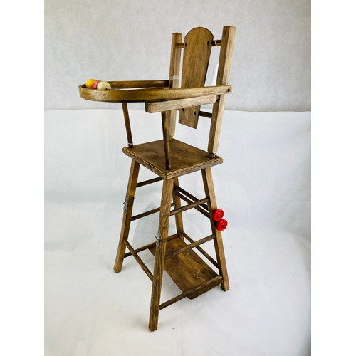 16 - Antique wooden dolls fold over high chair which turns into a push car 30''h