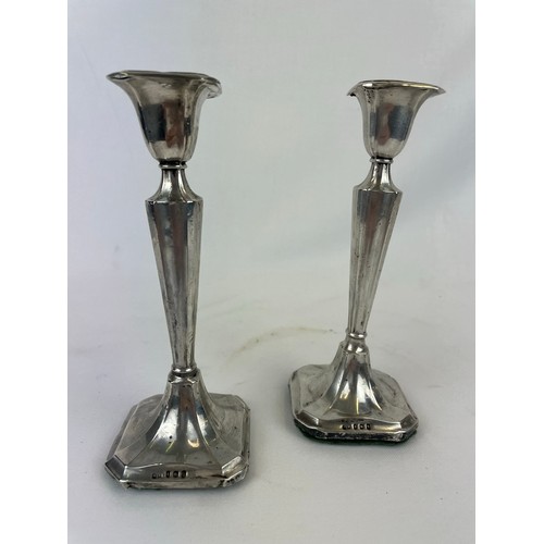 194 - Pair of hallmarked silver candle sticks