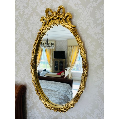 216 - Superb pair of Oval gilt framed mirrors, 40''h x 24''w