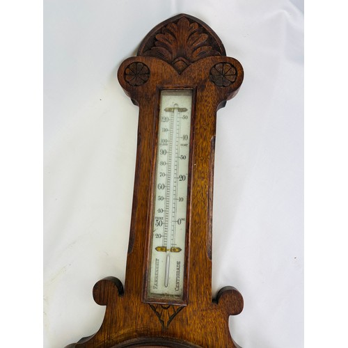 17 - Carved oak barometer