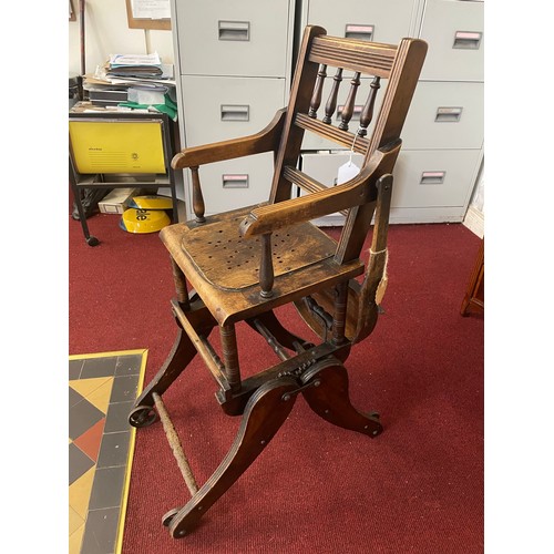 85 - Early Victorian Childs high chair on castors (folds 
 into a buggy), 37''h x 13'' w