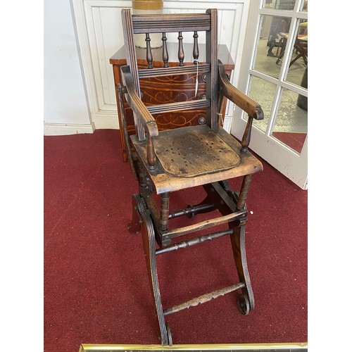 85 - Early Victorian Childs high chair on castors (folds 
 into a buggy), 37''h x 13'' w