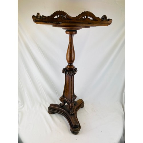 366 - Antique mahogany table with heavy carved pod