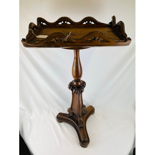 366 - Antique mahogany table with heavy carved pod