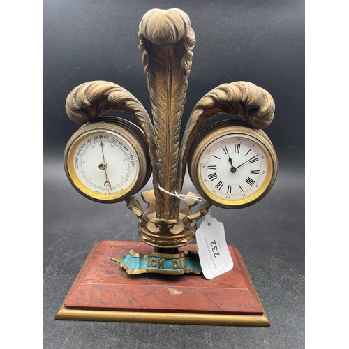 232 - Magnificent brass clock in the badge of the Prince of Wales with clock and barometer