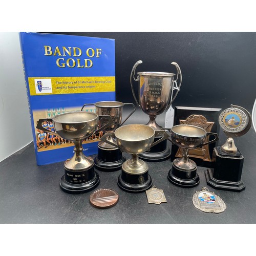 235 - A large collection of rowing trophies and copy of Band of Gold, presented to Cyril Mullins
Bonefield... 