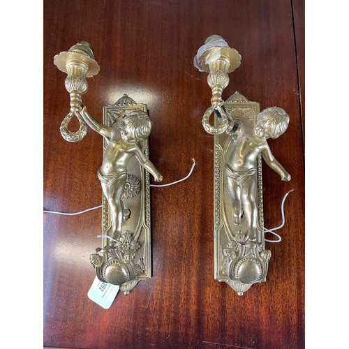 282 - A pair of Victorian brass cherub wall sconces 13''h