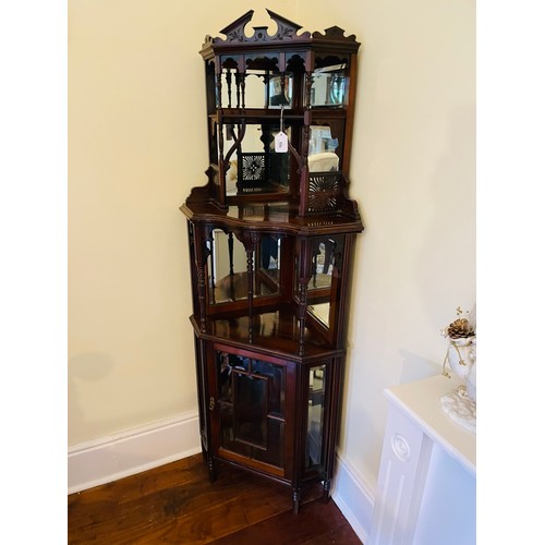 103 - Mahogany corner display cabinet with bevelled glass, 64''h x 24''w, c. 1890